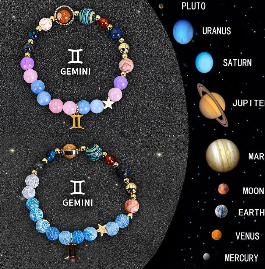 Set of two natural stone beaded bracelets with zodiac charms on a textured background.