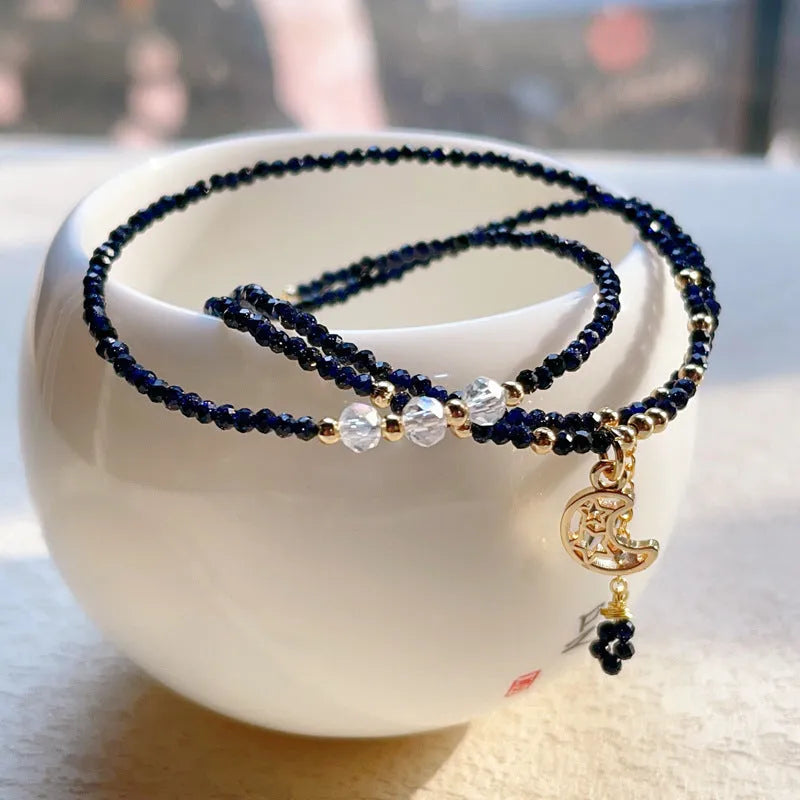 Women's handmade multi-layer bracelet with blue sand stone beads on three interlocking rings