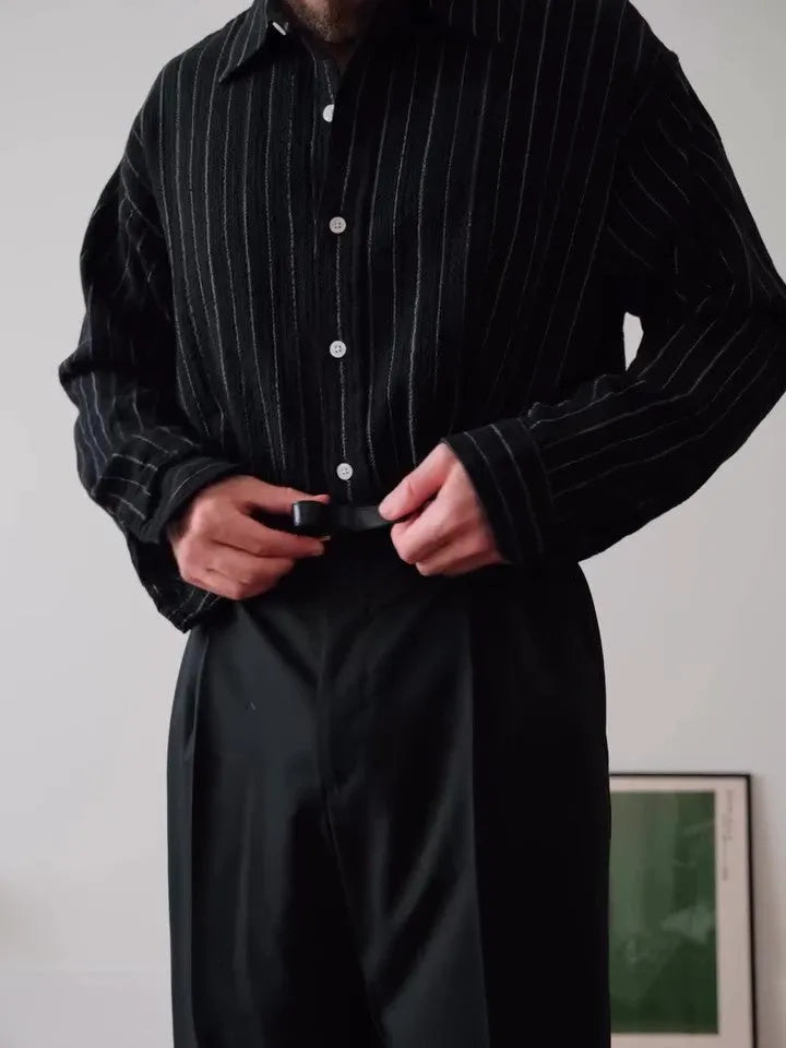 Men's black pinstripe button-down shirt with long sleeves and a regular fit