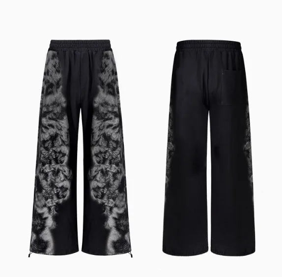 Loose fit street trendy printed trousers with polyester fabric and mid-waist design