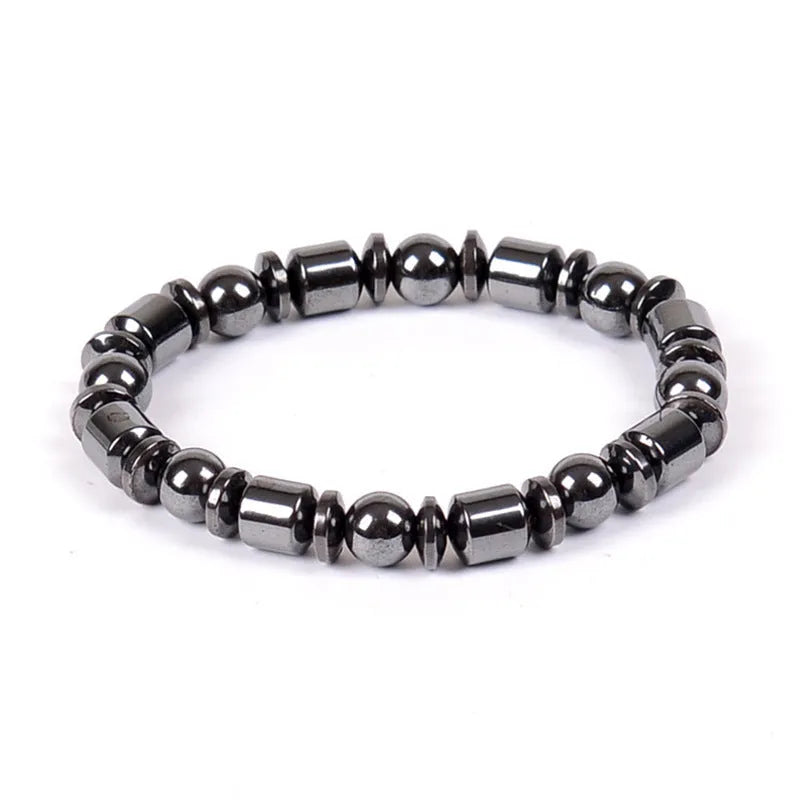 Black stretch bracelet with a pentagram design made from magnetite and hematite stones.