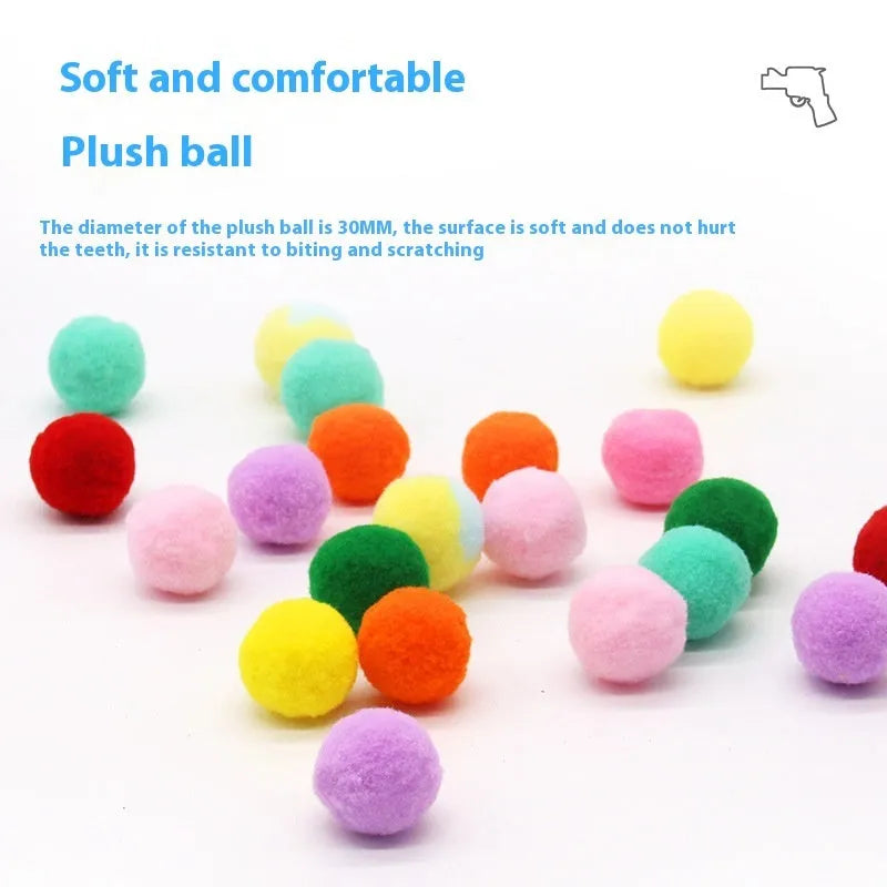 Pet toy launcher gun with assortment of soft plush balls for dog fetching games