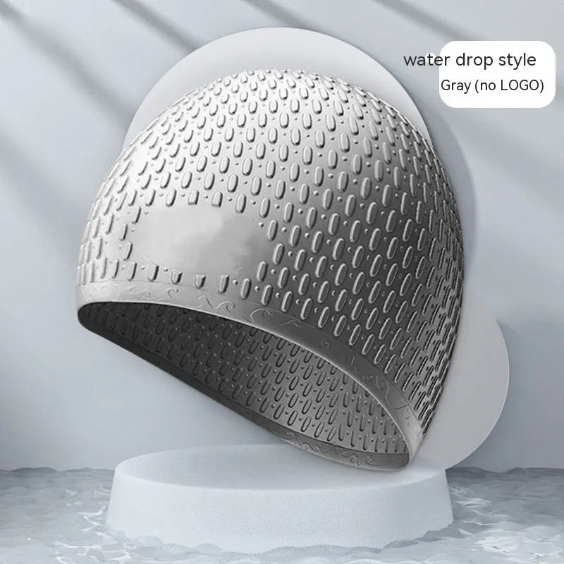 Silicone adult swimming cap with water drop texture in solid colour options on white background.