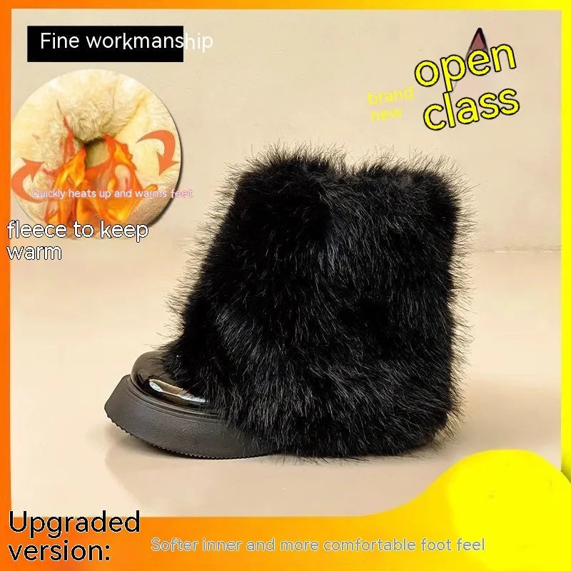 Women's low-top snow boots in black with a fleece lining and waterproof rubber platform sole.