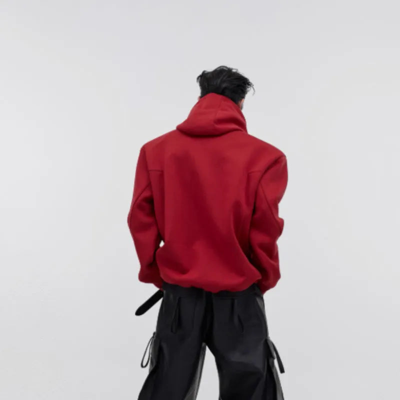 Men's red hooded sweater with three-dimensional printing design and structured shoulder pads in loose fit