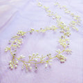 Gold crystal and pearl wedding hair band made with colour-preserving wire, shown at 50cm length.