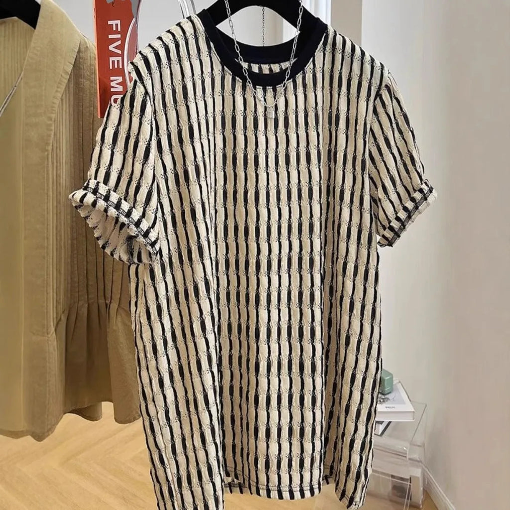 Men's black striped short sleeve shirt in loose silk-linen blend on hanger