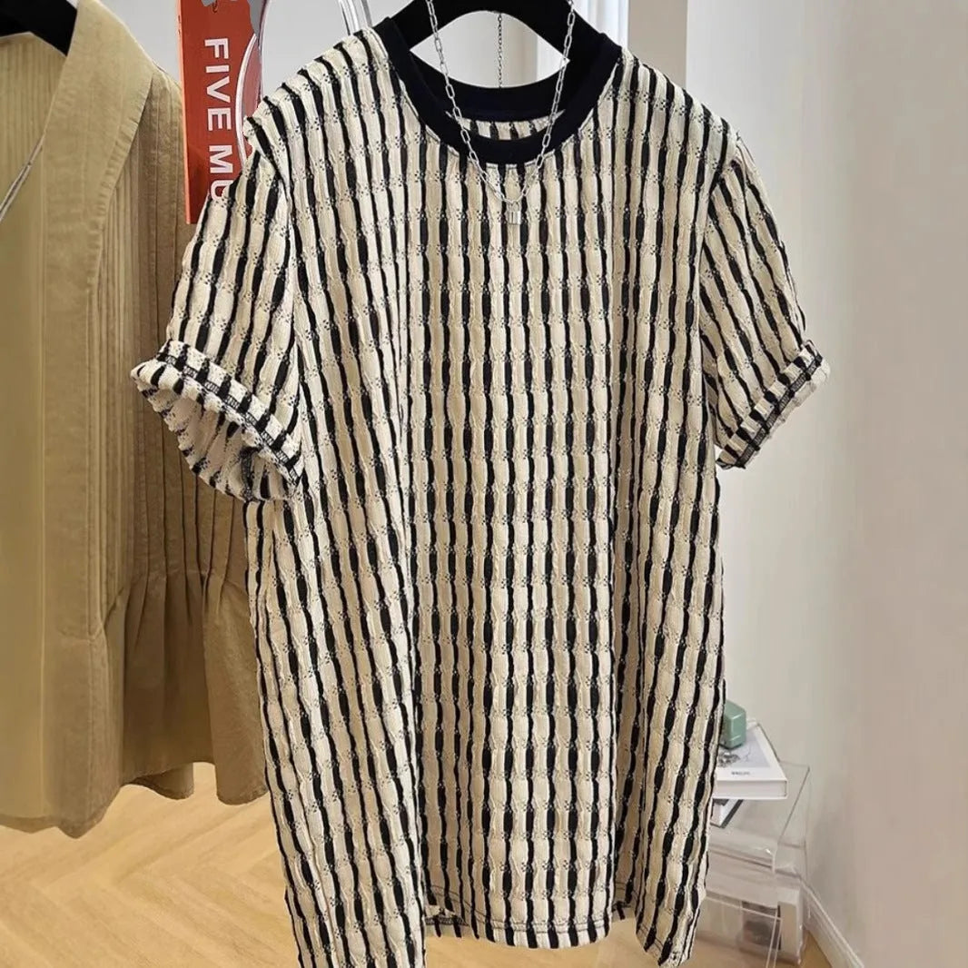 Men's black striped short sleeve shirt in loose silk-linen blend on hanger