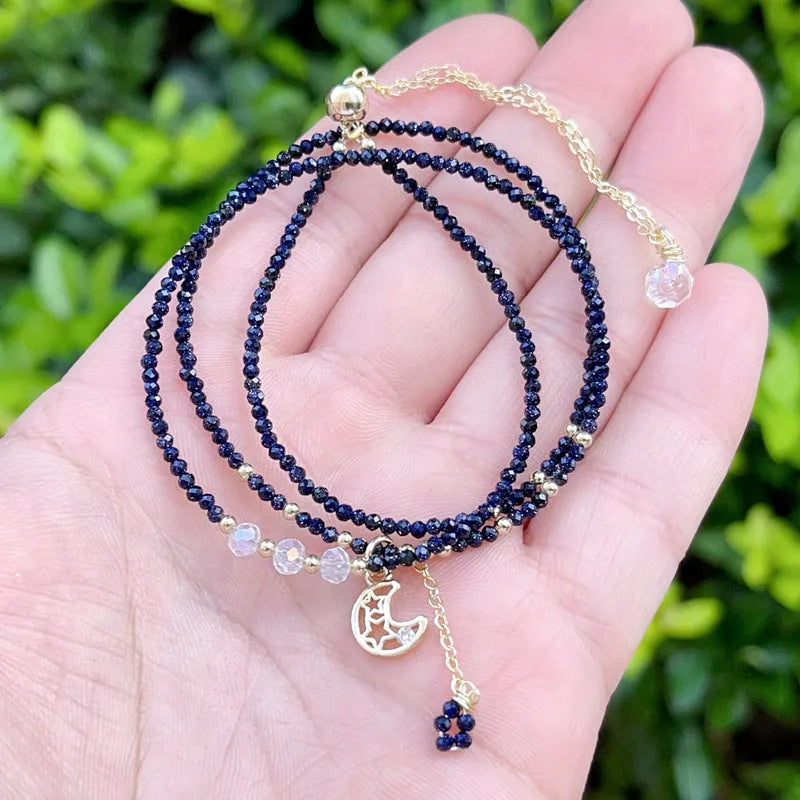 Women's handmade multi-layer bracelet with blue sand stone beads on three interlocking rings