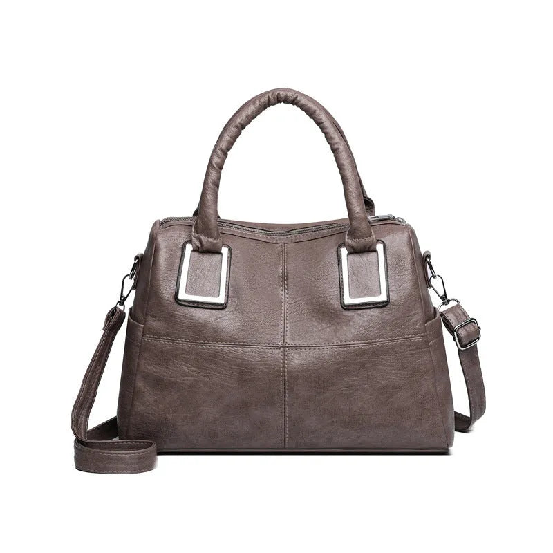Women's large capacity shoulder bag in horizontal square shape with internal phone pocket and document compartment