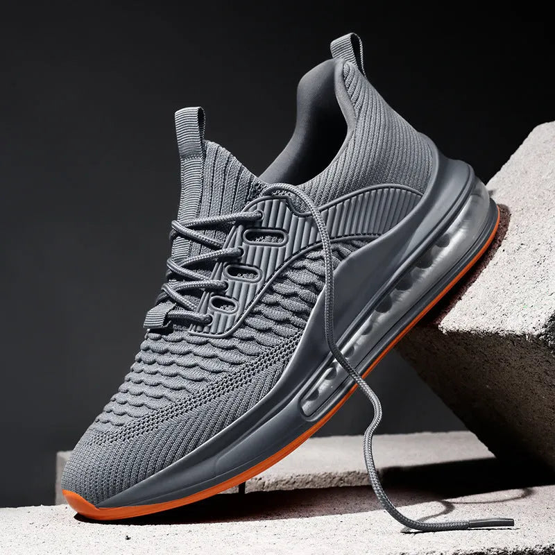 Men's black low-top mesh running shoes with round toe and lace-up front on a white background.