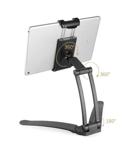 Silver aluminium alloy adjustable desktop stand holding a tablet, showing 360-degree rotation and mounting hardware.