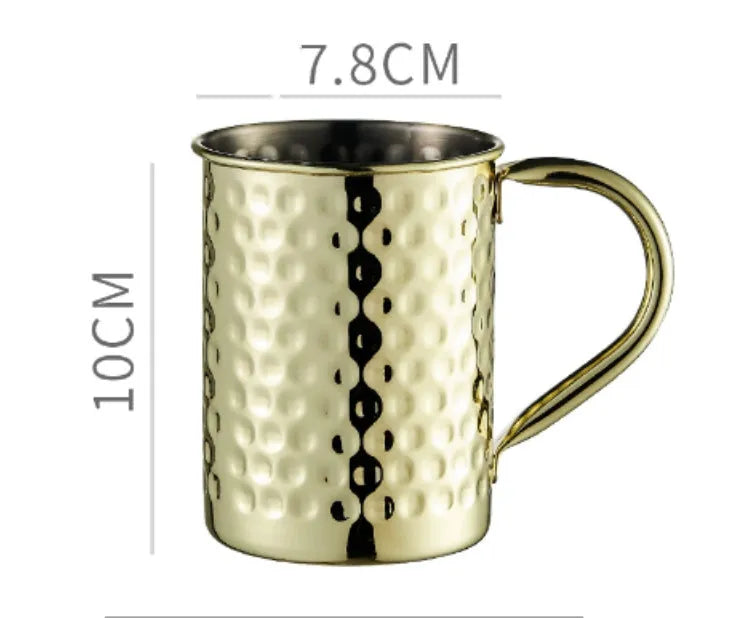 Stainless steel Moscow Mule cup with copper plating in hammer point style showing metallic finish.