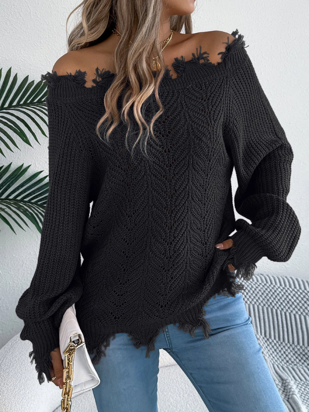 White hollow-out long-sleeved pullover sweater with cut off-the-shoulder design