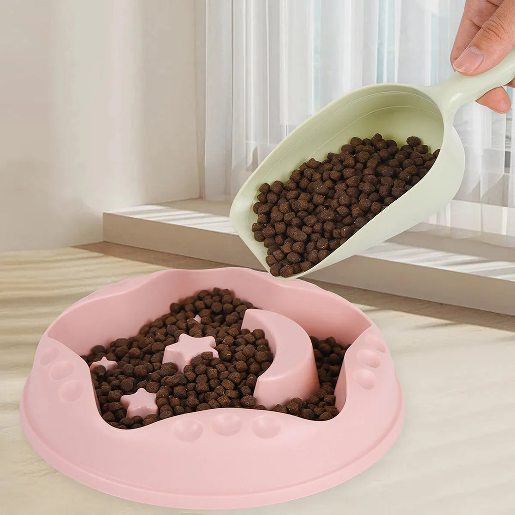 Moon Star Wings ceramic dog slow feeder bowl with raised centre ring and non-slip base in blue, grey, green, pink, or yellow.