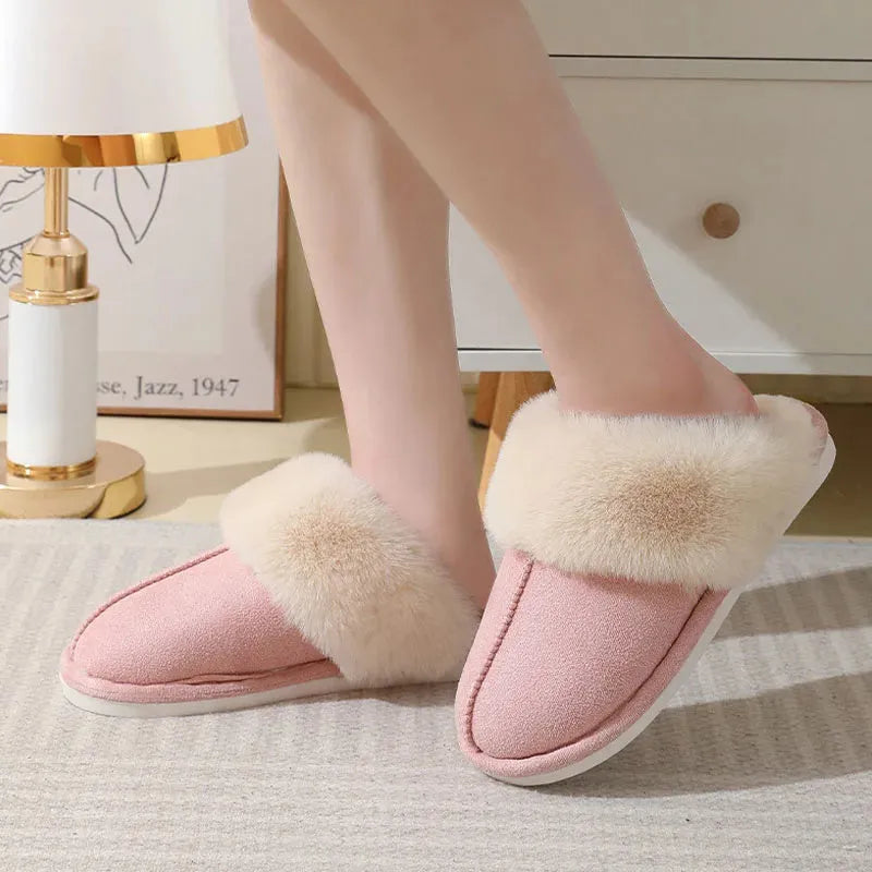 Brown women's plush indoor slippers with round toe, stitching detail, and flat non-slip sole.