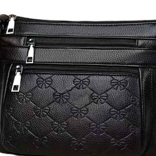 Butterfly black women's crossbody messenger bag with embossing details and horizontal square shape