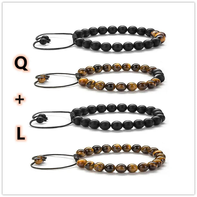 Pair of matte black agate bead bracelets with geometric design for couples.