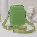 Solid colour small crossbody mobile phone bag in beige, showing front view and adjustable strap.