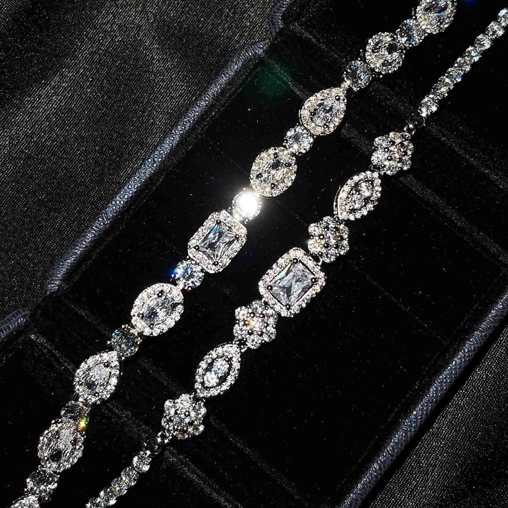 Women's geometric bracelet with zircon stones on silver-toned band showing adjustable and fixed length options