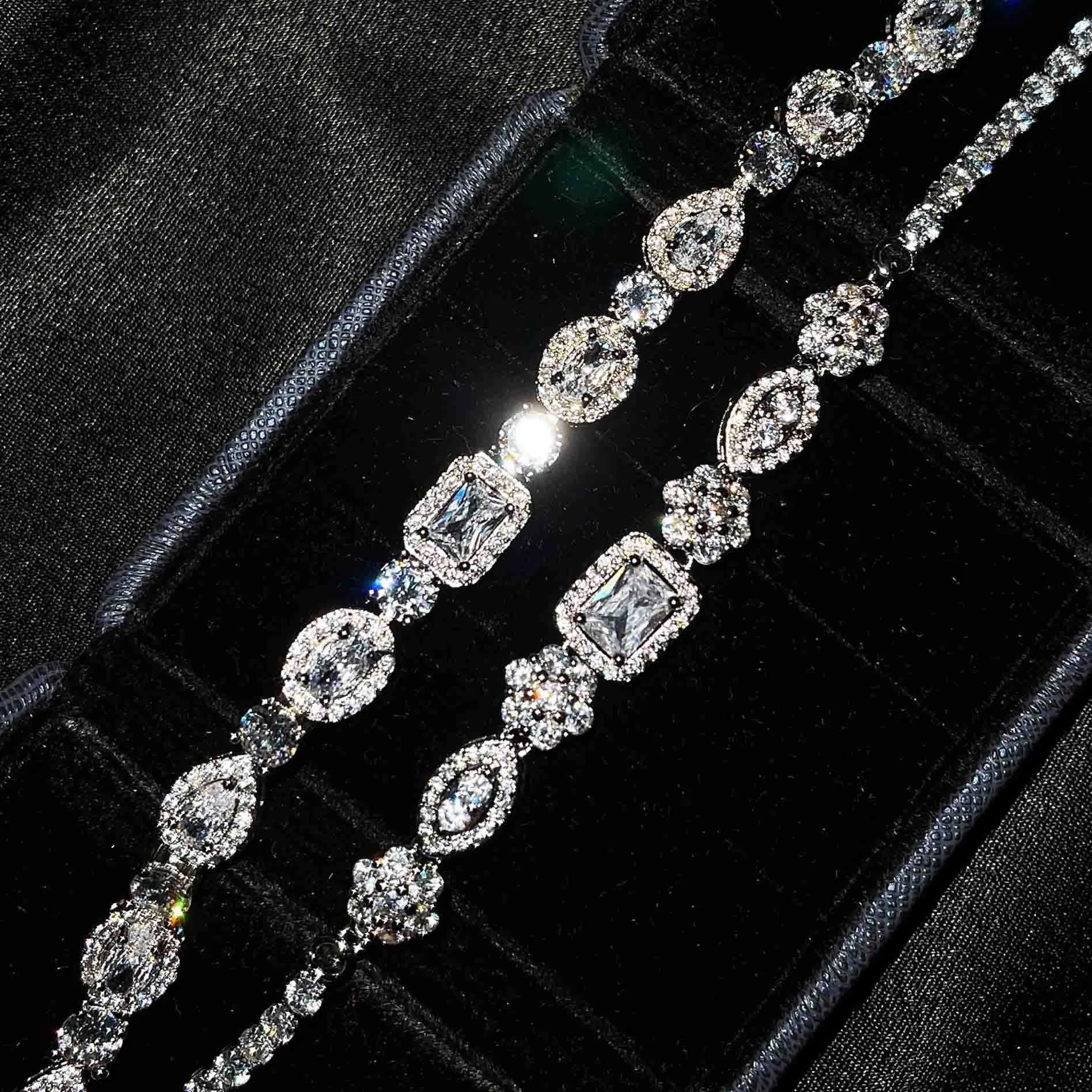 Women's geometric bracelet with zircon stones on silver-toned band showing adjustable and fixed length options
