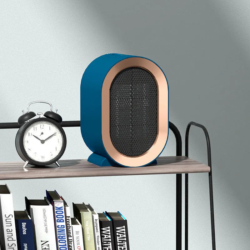 Compact desktop electric heater with ceramic heating element and mechanical control dial