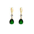 Green geometric teardrop earrings with alloy construction showing structured patterning