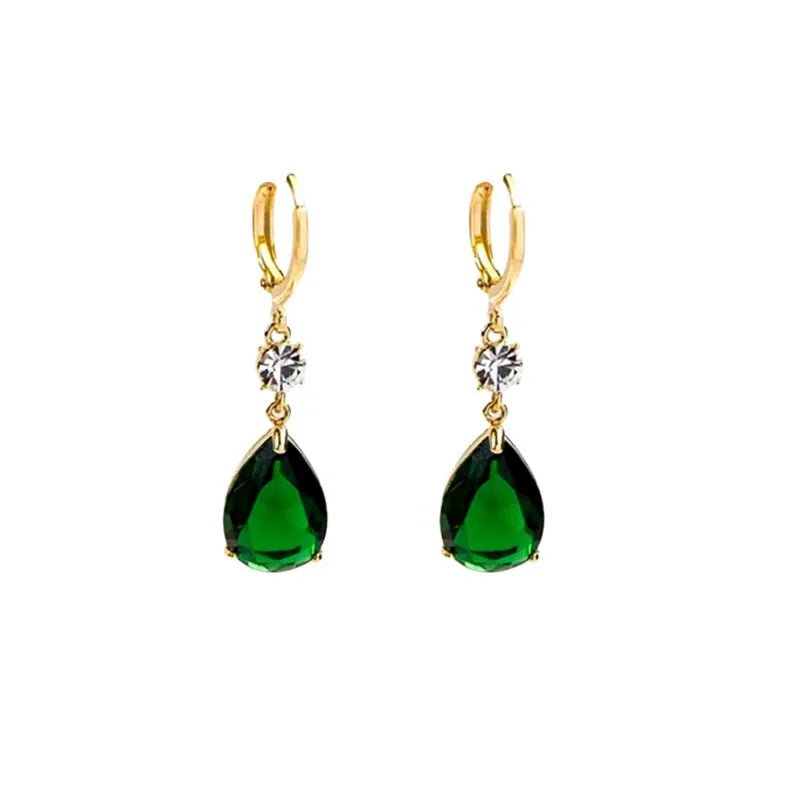 Green geometric teardrop earrings with alloy construction showing structured patterning