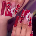 Flower-patterned artificial nails with red diamond accents in European square long shape