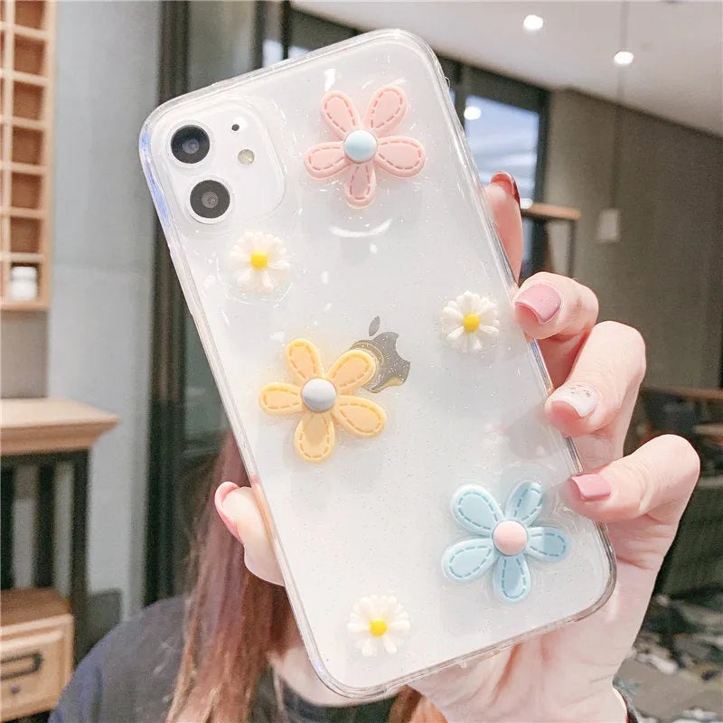 Soft rubber iPhone case with embossed floral pattern and heart design on a white background.