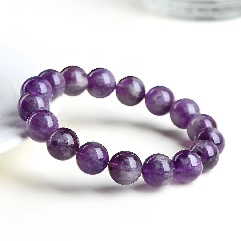 Natural feather amethyst Snow Mountain purple scattered bead crystal bracelet with ruyi charm.