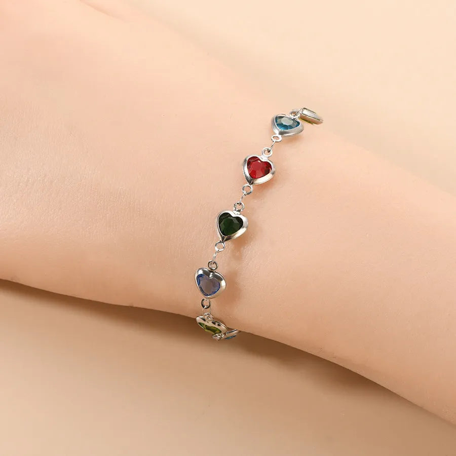 Devil's Eye geometric heart bracelet in stainless steel showing six colour options on white background
