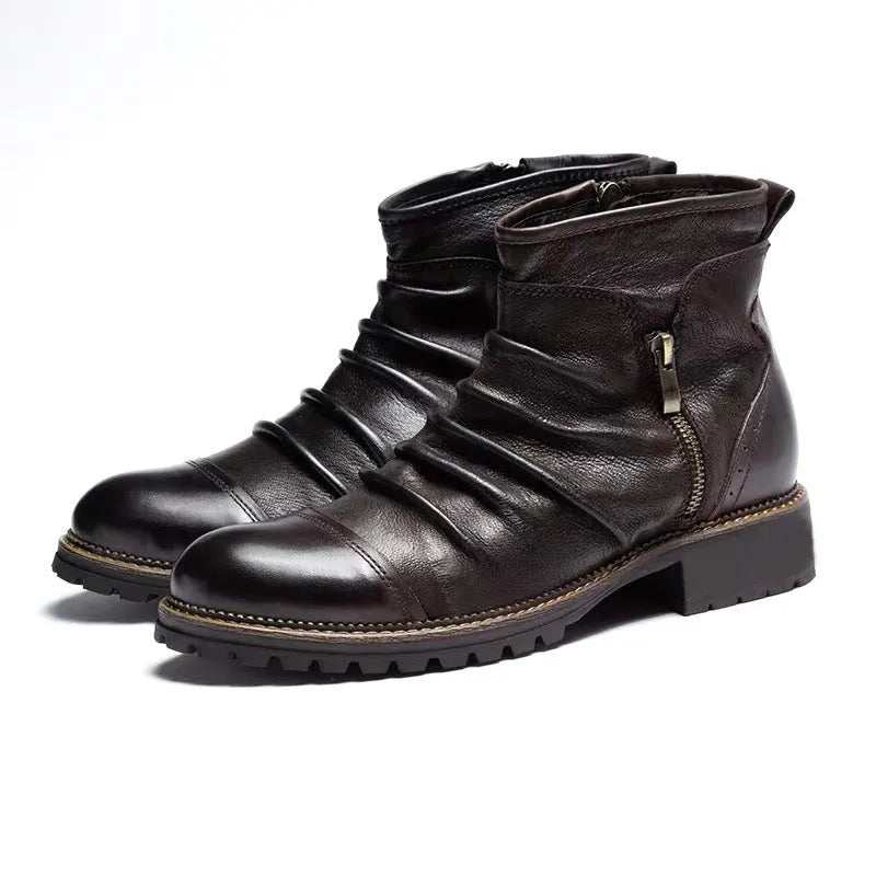 Brown mid-calf cowboy boots with side zipper, round toe, and horseshoe heel on wooden floor