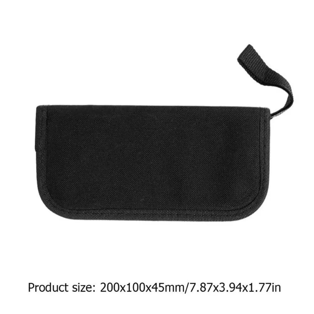 Black guitar repair tool kit open to show metal and plastic maintenance tools for guitars and other string instruments.