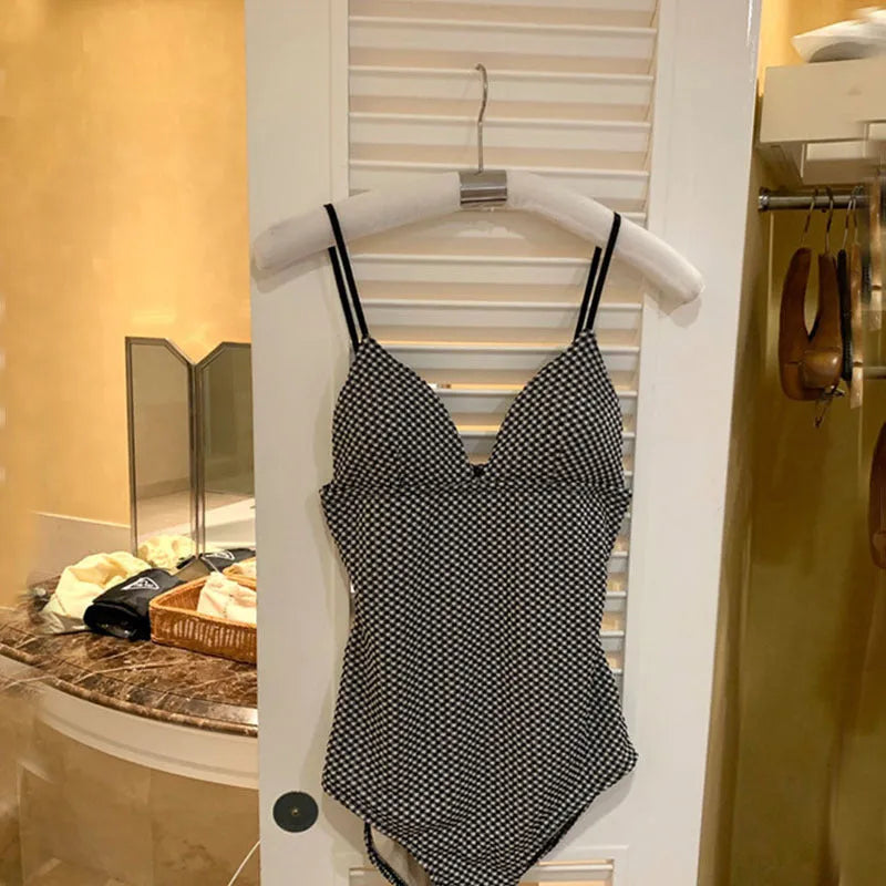 Blue one-piece swimsuit for slender builds with belly coverage and small chest support
