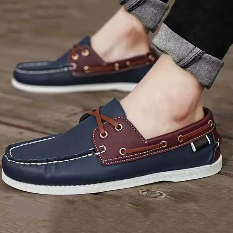 Men's solid colour casual shoes with round toe and flat heel on a white background.