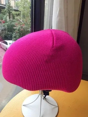 A size L decorative cover for a ski helmet, shown in one of fifteen available colour options.