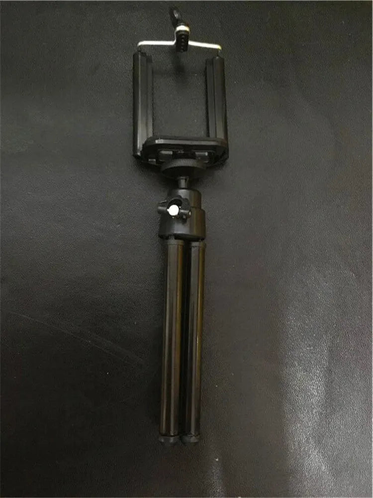Black or silver desktop phone holder with a two-section adjustable bracket.
