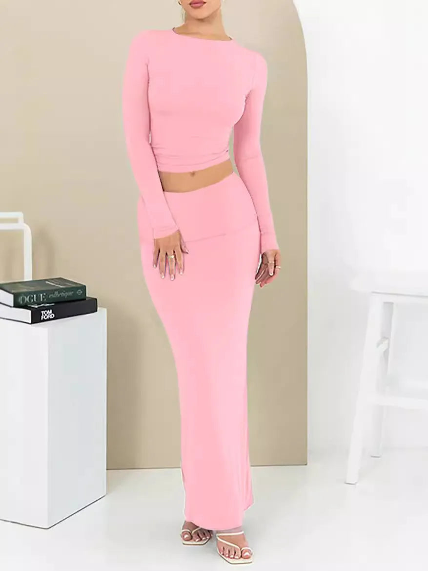 Women's sweet style two-piece suit set with long skirt and three-quarter sleeves in solid colour.