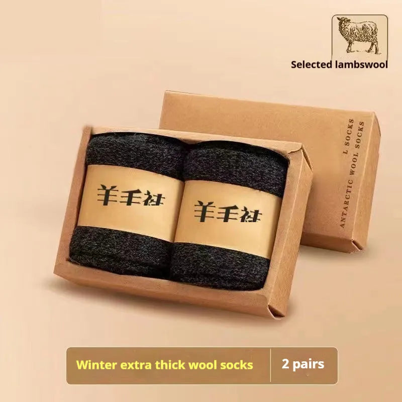 Pair of thick solid-colour wool socks with a merino midsole, shown with a storage box.