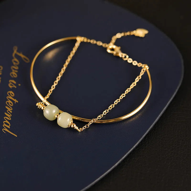 Jade lucky bead bracelet for women with gold inlay treatment in single, double and three beads versions