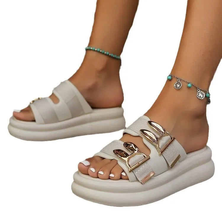 Women's slippers with suede uppers and thick rubber soles in apricot, black, and off white colours