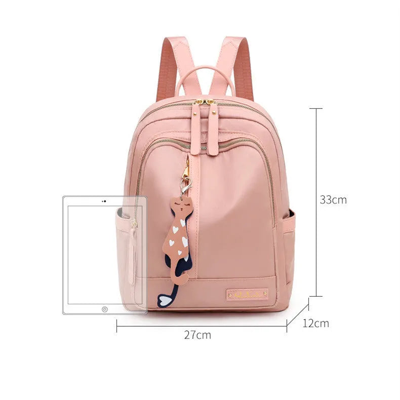 Black and pink casual nylon backpack with double straps, soft handle, and square vertical shape