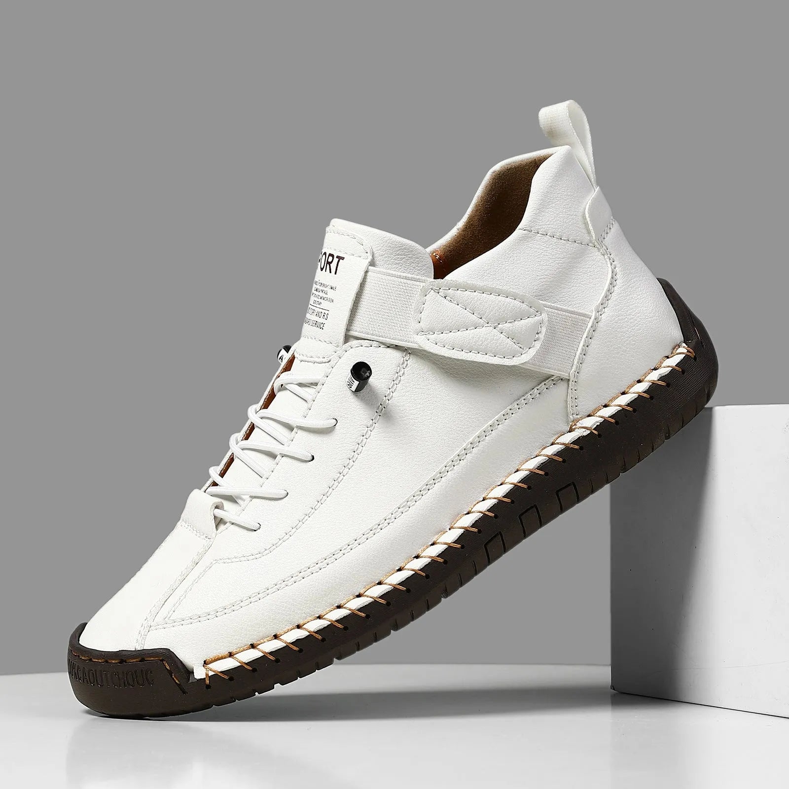 Men's mid-top Martin boot in khaki colour with tooling stitching on the rubber sole.