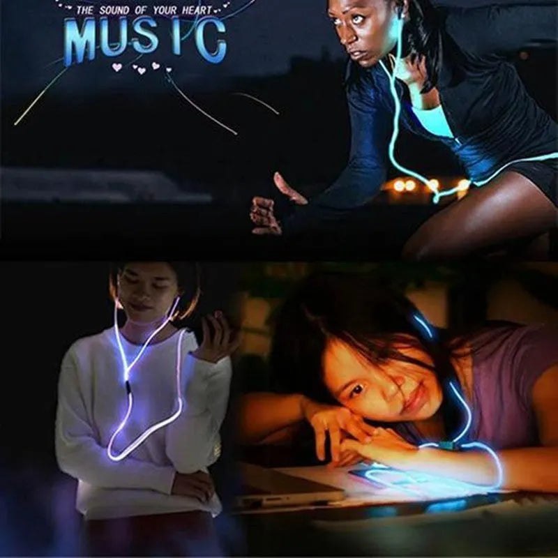 Blue LED light up earphones with 3.5mm plug and in-line remote control on a dark background