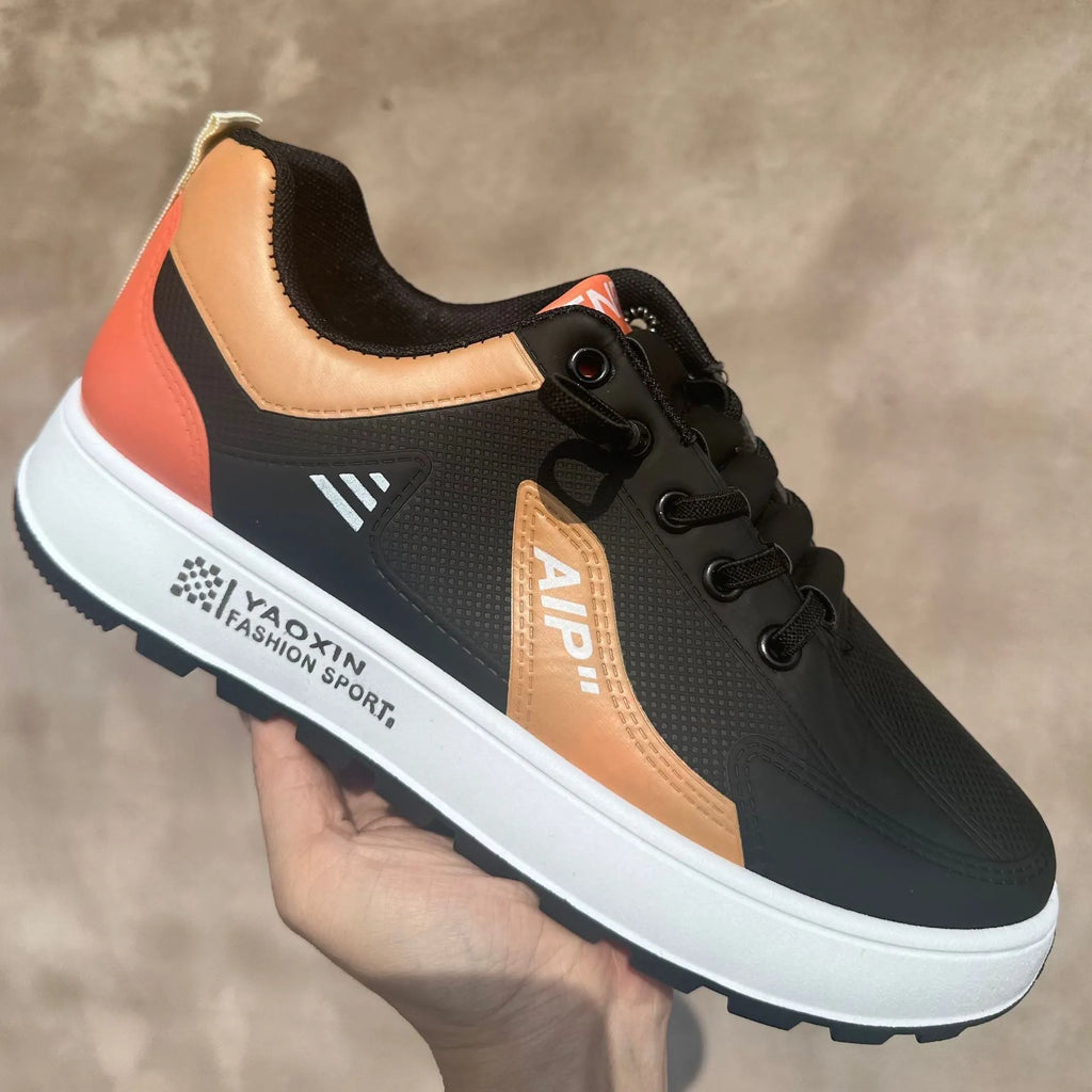 Men's white and black casual sports shoes with a round toe and PU upper.