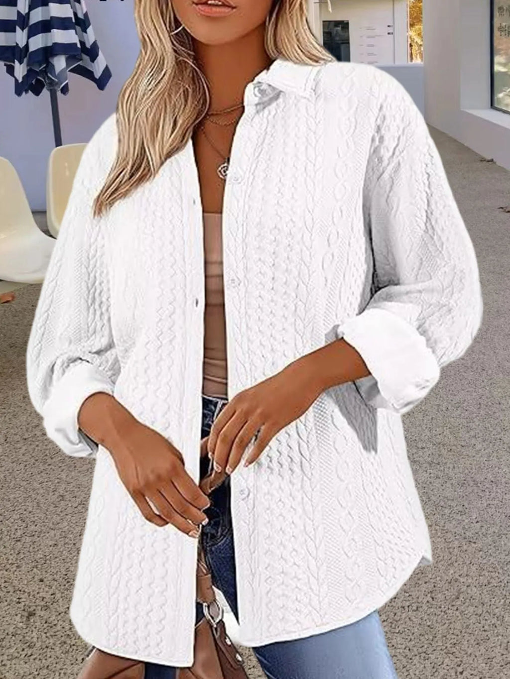 Women's solid colour long-sleeved knit cardigan in black, shown open as a layering piece.