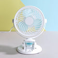 Small white USB desk fan shown in clip-on and floor-standing styles on a wooden desk.