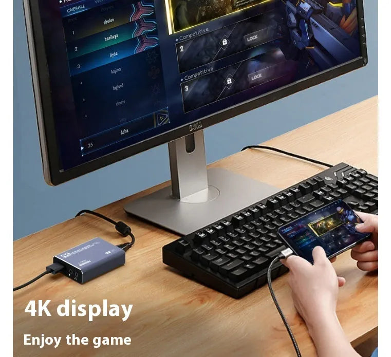 Black 4K gaming set-top box for USB audio recording with MS2131 chip and data cable.