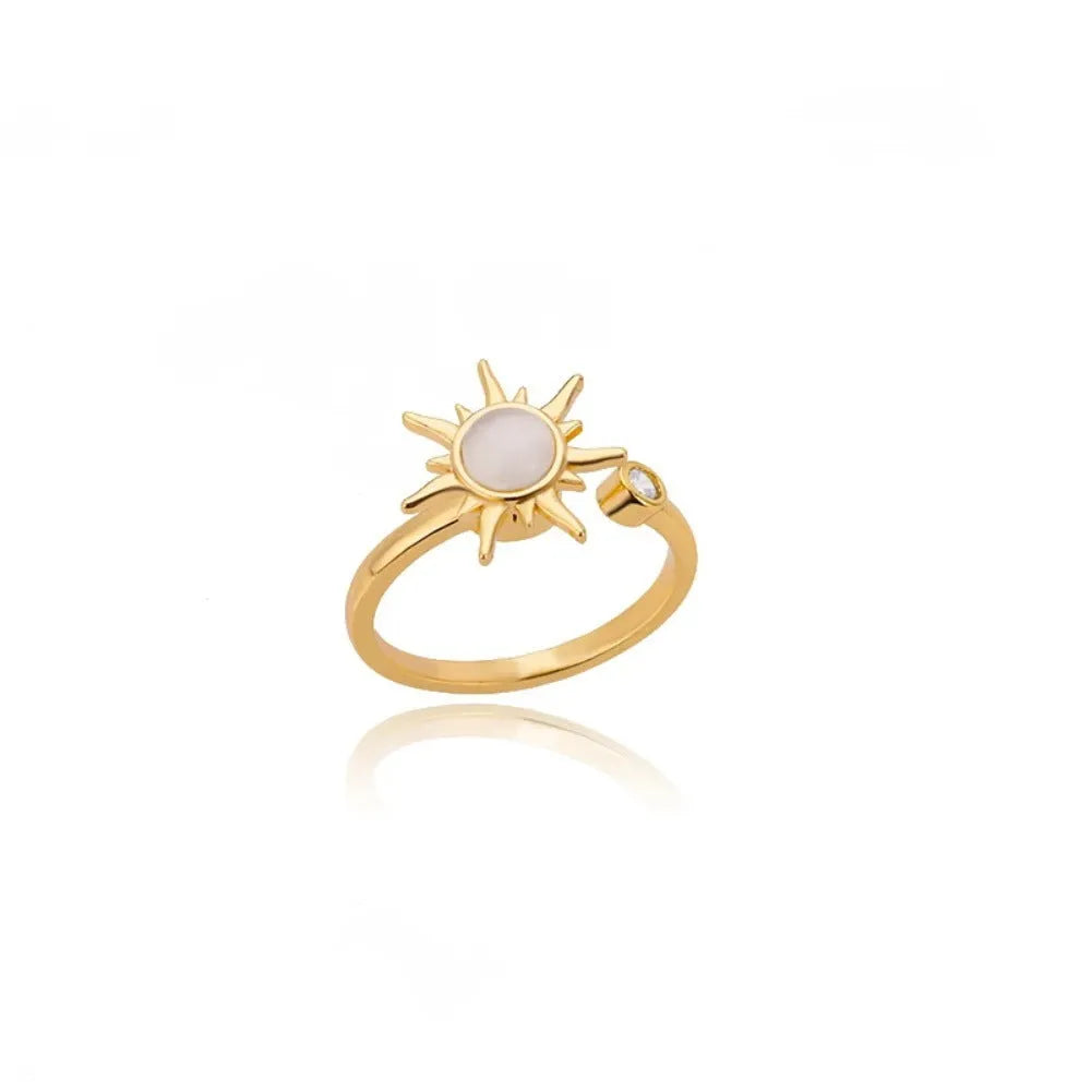 Simple geometric copper decompression ring with rotating mechanism in gold or platinum finish
